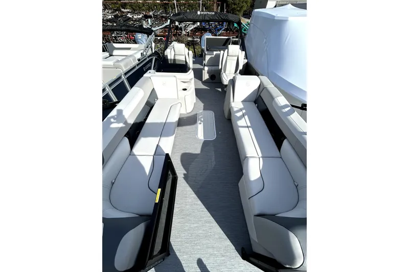 Slide: The Image of 2026 Godfrey SWEETWATER 2486 DT pontoon boat interior with spacious seating. - 5