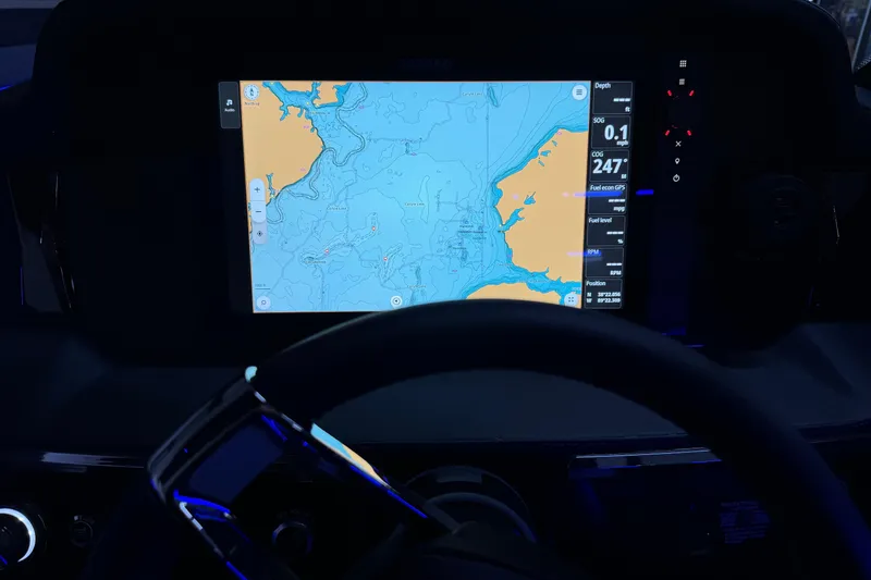 Slide: The Image of 2026 Chaparral SSX 30 dashboard with navigation display and steering wheel. - 15