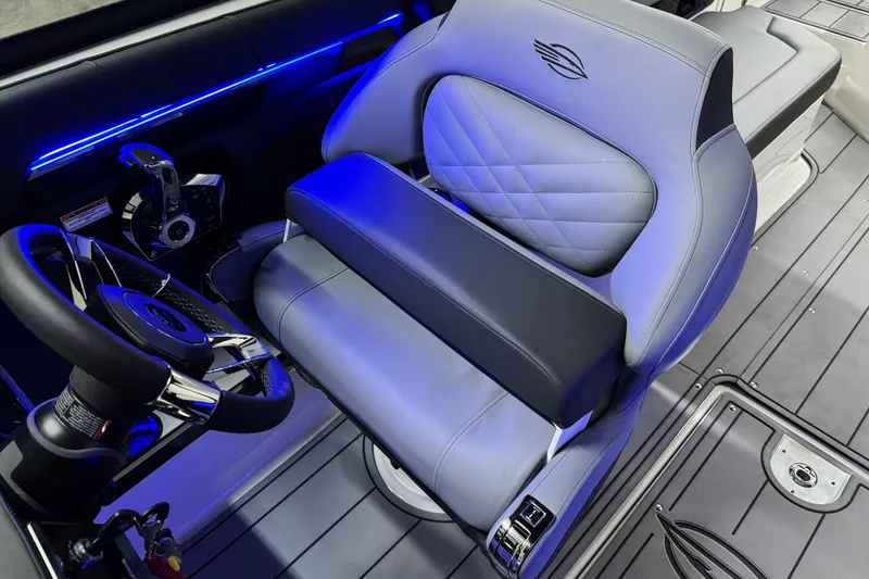 Slide: The Image of 2026 Chaparral SSX 30 boat interior with modern steering and luxurious seating. - 18