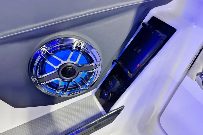 Slide: The Image of Speaker and wireless charging pad on 2026 Chaparral SSX 30 boat. - 21