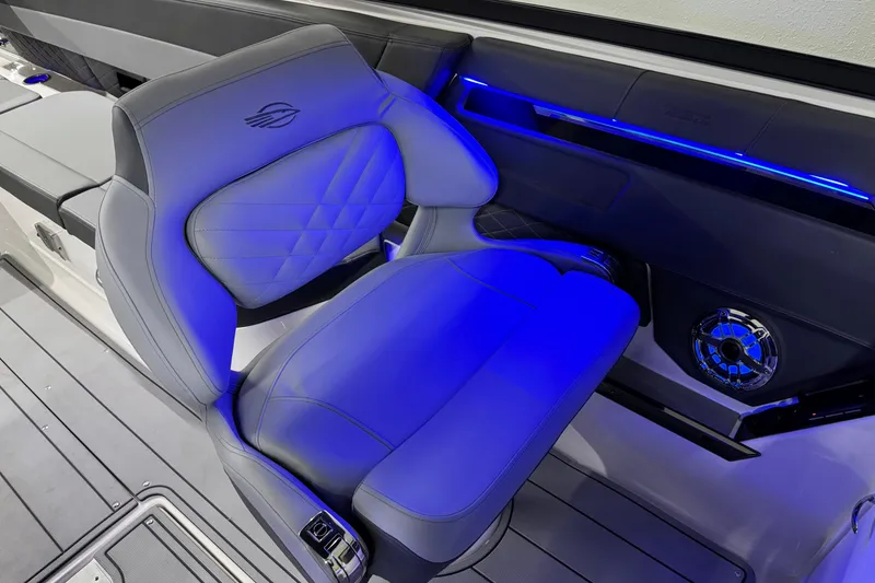 Slide: The Image of Luxury seating in 2026 Chaparral SSX 30 boat with blue LED lighting. - 22
