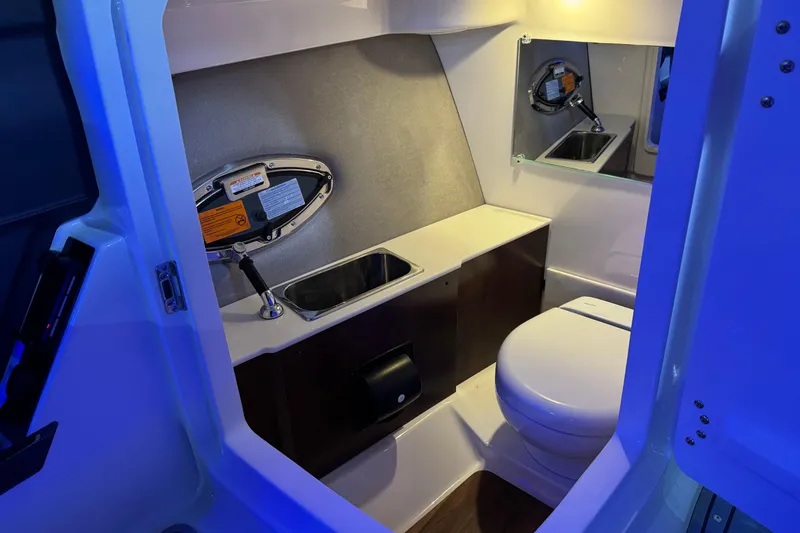 Slide: The Image of 2026 Chaparral SSX 30 boat interior bathroom with sink and toilet. - 26