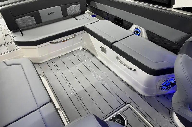 Slide: The Image of 2026 Chaparral SSX 30 boat interior with sleek seating and modern design. - 28