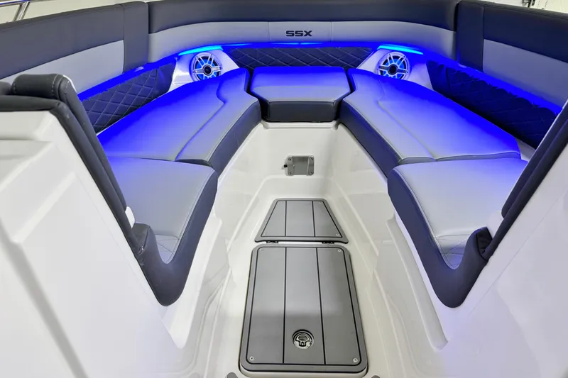 Slide: The Image of Luxurious interior of 2026 Chaparral SSX 30 boat with blue LED lighting. - 34
