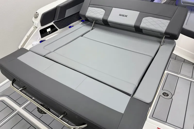 Slide: The Image of 2026 Chaparral SSX 30 boat interior with gray cushioned seating and sleek design. - 7