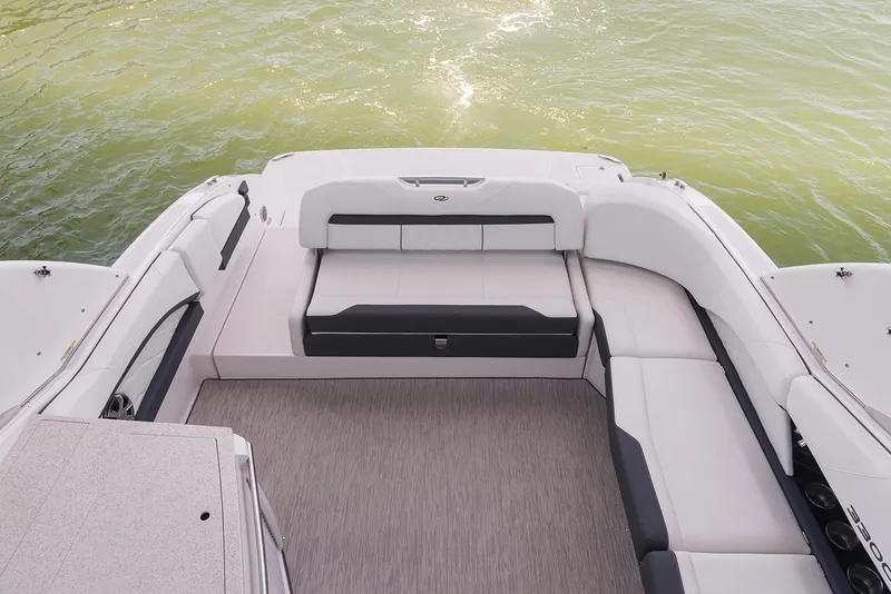 Slide: The Image of Interior of a 2026 Regal 3300 boat showcasing luxurious seating and modern design. - 12