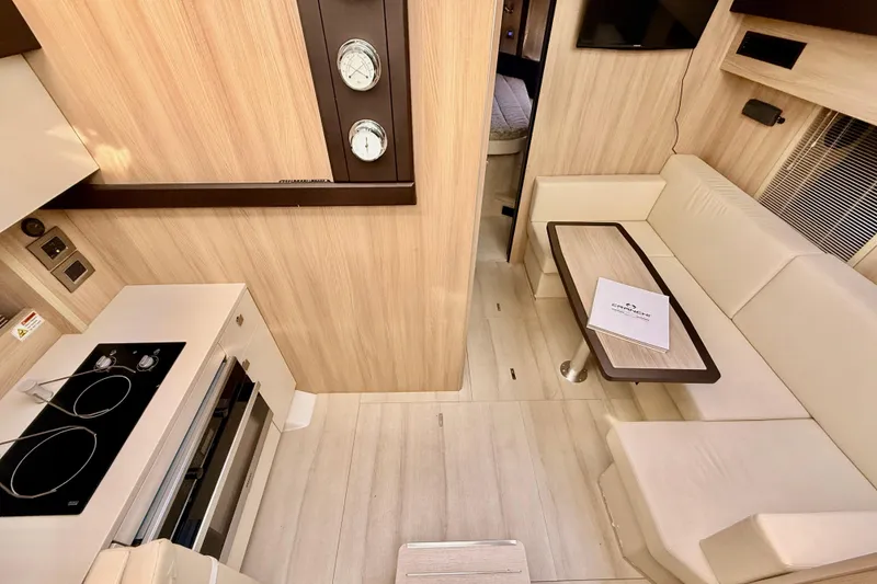 Slide: The Image of Interior of 2016 Cranchi M44 HT yacht with modern kitchen and skylight. - 46