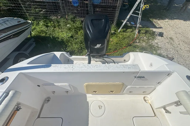 Slide: The Image of 2005 Pro-Line 24 Sport boat with outboard motor, viewed from above. - 56