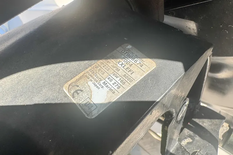 Slide: The Image of Label on a 2005 Pro-Line 24 Sport boat component, showing specifications and serial number. - 60