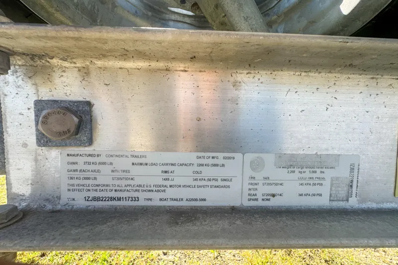 Slide: The Image of Label on Continental Trailers boat trailer, detailing specifications and manufacturing information. - 85