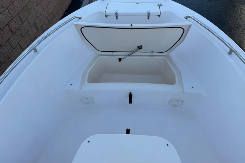 Slide: The Image of 2008 Grady-White Sportsman 180 boat with open storage compartment. - 10