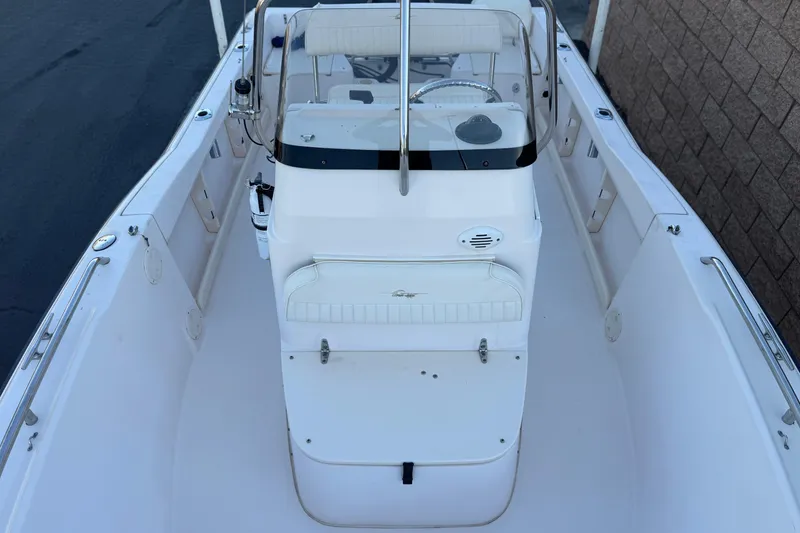 Slide: The Image of 2008 Grady-White Sportsman 180 boat interior with steering console and seating. - 13