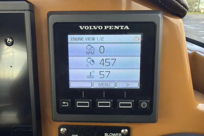 Slide: The Image of Volvo Penta engine display on 2016 Cutwater C-242 Coupe showing RPM and temperature. - 26