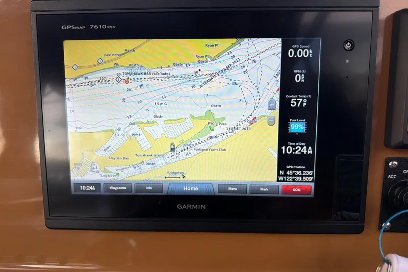 Slide: The Image of Garmin GPS display on 2016 Cutwater C-242 Coupe, showing navigation map and vessel data. - 27