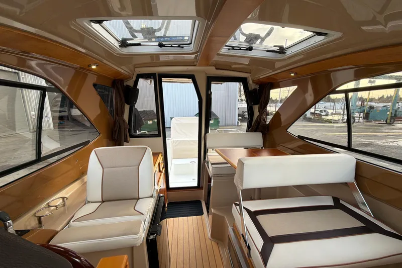 Slide: The Image of Interior of 2016 Cutwater C-242 Coupe boat with seating and table. - 41