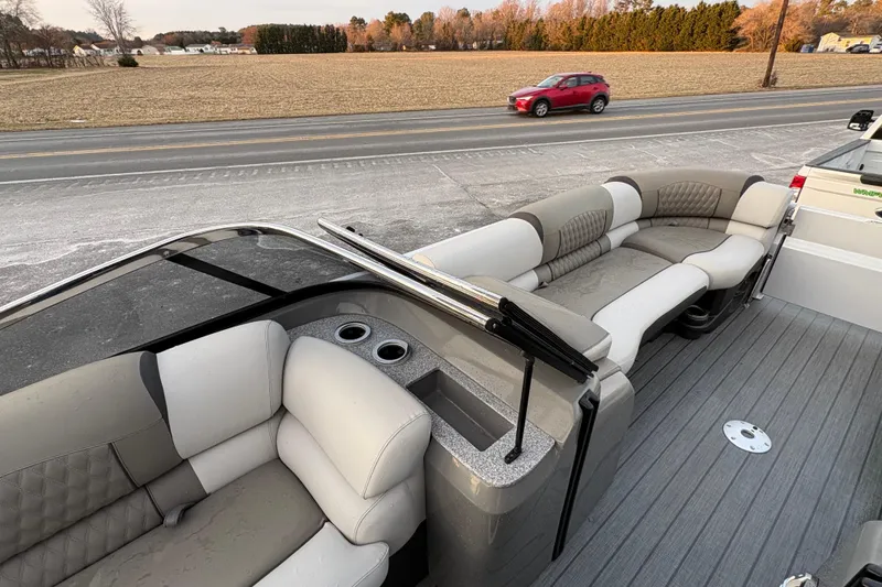 Slide: The Image of 2023 Avalon Excalibur 2585 Windshield Elite boat with luxurious seating and modern design. - 16