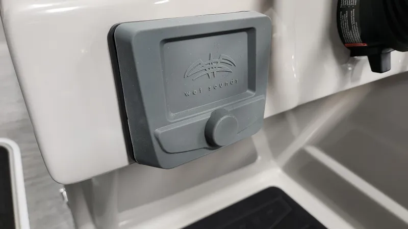 Slide: The Image of Close-up of a gray speaker labeled "Wet Sounds" on a boat. - 28