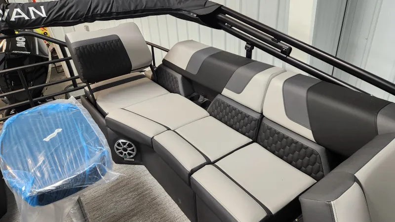Slide: The Image of The image shows the interior of a 2026 Sylvan L3 SLZ with modern, cushioned seating. - 15