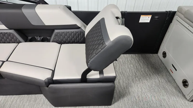 Slide: The Image of Interior of a 2026 Sylvan L3 SLZ with gray upholstery and modern design. - 18