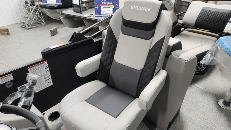 Slide: The Image of The 2026 Sylvan L3 SLZ features a luxurious captain's chair with gray and black upholstery. - 24