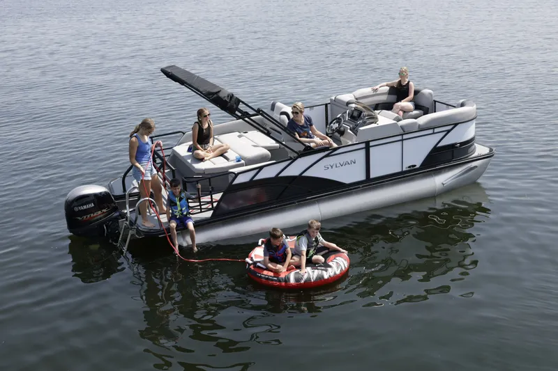 The Image of Family enjoying Sylvan L3 DLZ pontoon boat on the water. - 0