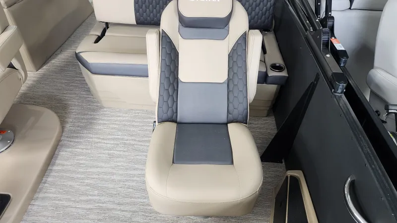Slide: The Image of Interior of a 2026 Sylvan L3 DLZ with beige and gray upholstery. - 14
