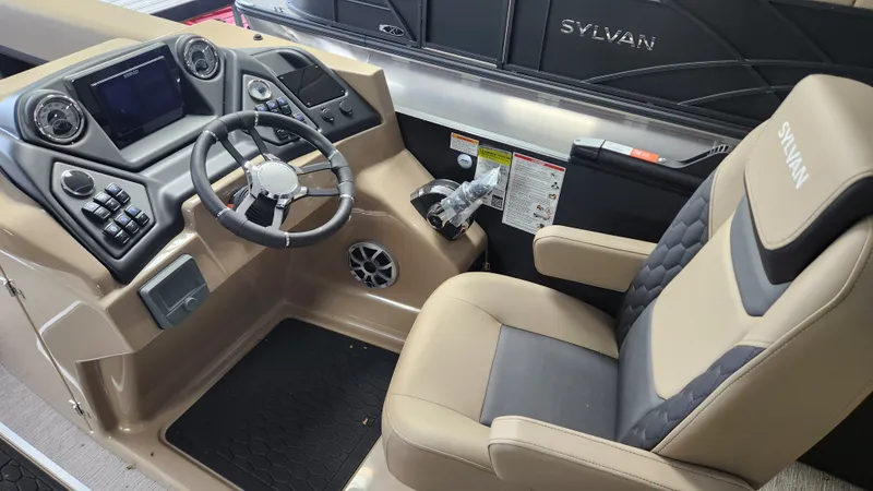 Slide: The Image of The image shows the cockpit of a Sylvan L3 DLZ boat with a modern helm and comfortable seat. - 16