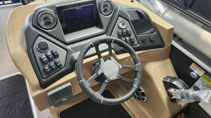 Slide: The Image of The image shows the helm of a Sylvan L3 DLZ boat with modern instruments. - 17