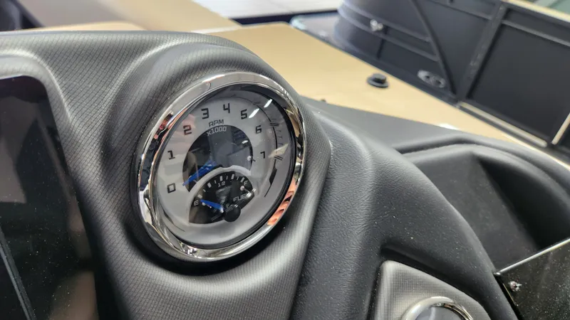 Slide: The Image of Close-up of a tachometer on a 2026 Sylvan L3 DLZ boat. - 20