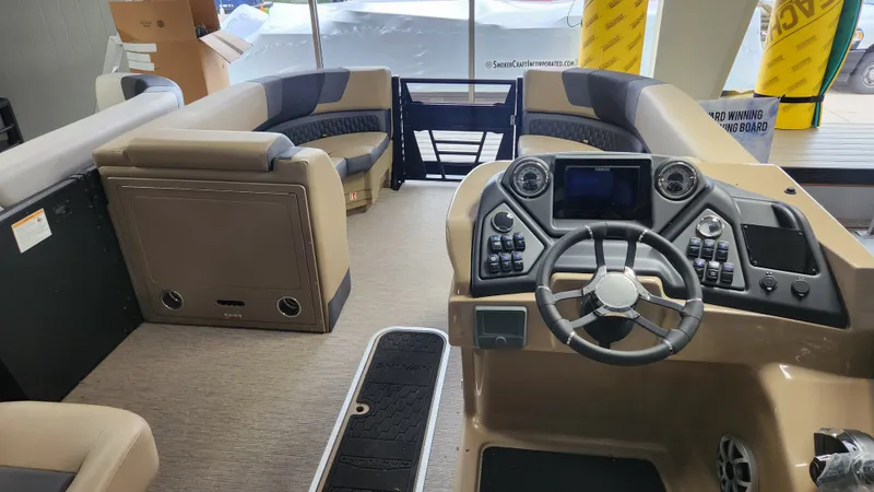Slide: The Image of Interior of a 2026 Sylvan L3 DLZ with steering wheel and seating area. - 34