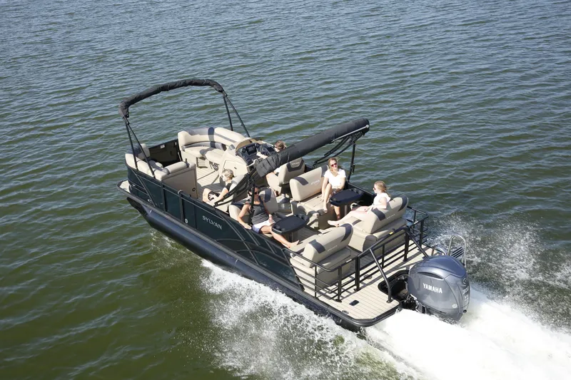 Slide: The Image of 2026 Sylvan L-3 RLZ pontoon boat on water with passengers. - 1