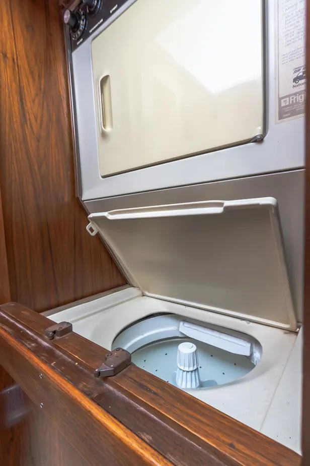 Slide: The Image of Laundry area in a 1987 Californian 48 Convertible yacht. - 44