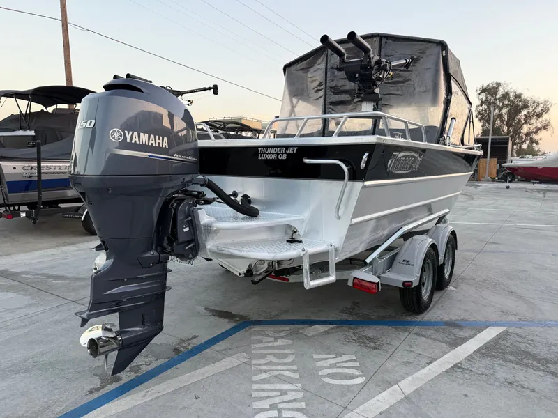 Slide: The Image of Thunder Jet Luxor OB w/ 150HP Yamaha & a 9.9HP Kicker! 2015 - 4
