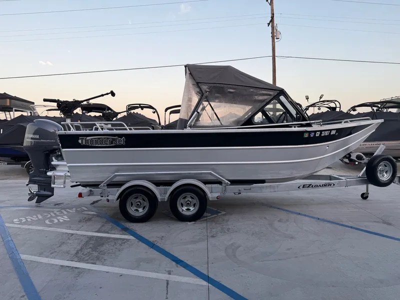 Slide: The Image of Thunder Jet Luxor OB w/ 150HP Yamaha & a 9.9HP Kicker! 2015 - 9