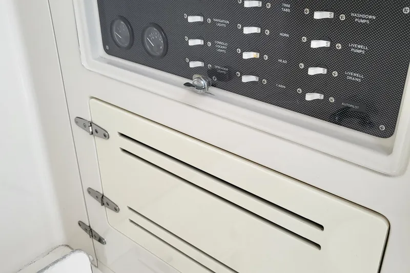 Slide: The Image of Jupiter 31 Center Console 2004, control panel and hinged door. - 13