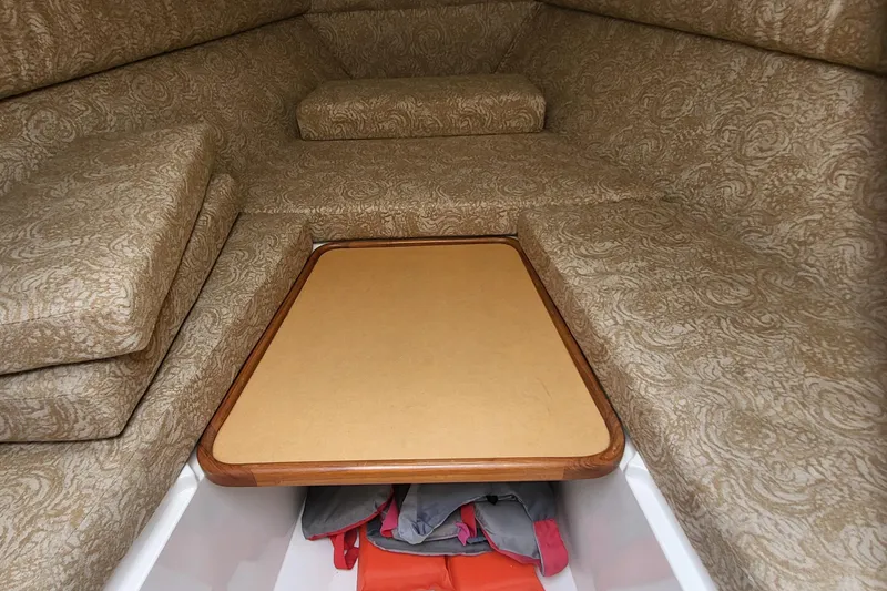 Slide: The Image of Interior of 2004 Jupiter 31 Center Console boat with upholstery. - 8