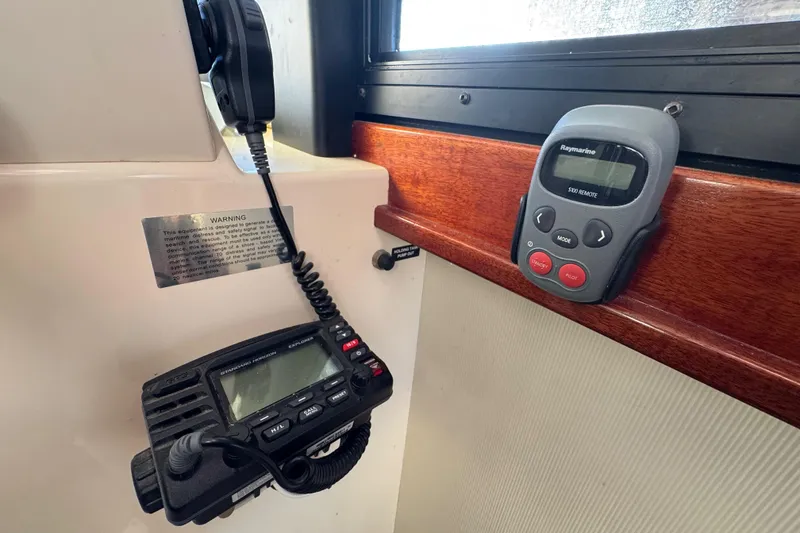 Slide: The Image of Interior of a 2002 Camano Troller boat showing helm and captain's chair. - 24