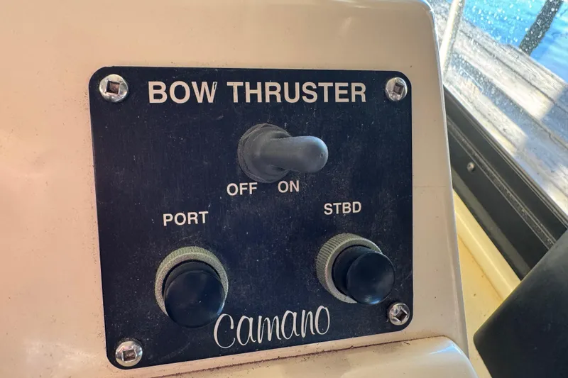 Slide: The Image of Electrical panel on a 2002 Camano with shore, reverse polarity, and generator options. - 33