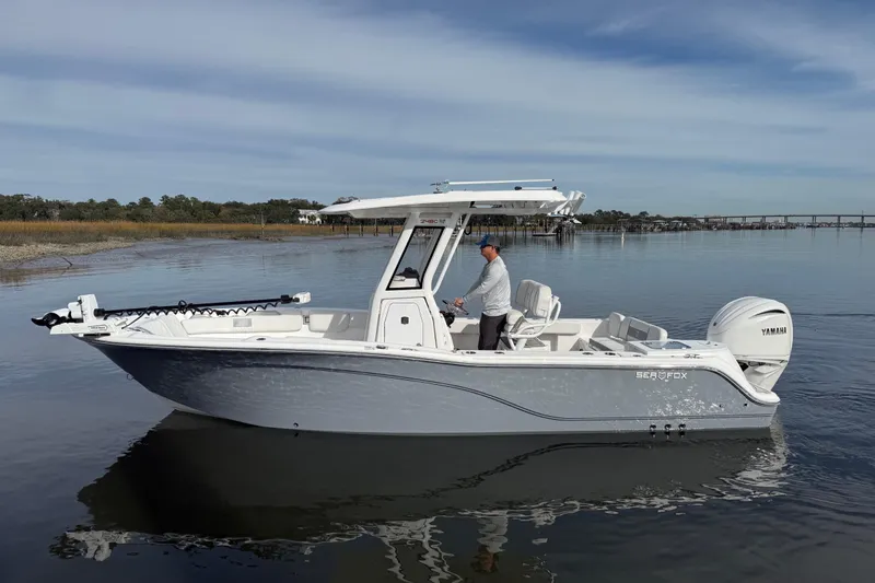 The Image of 2025 Sea Fox 248 Commander boat on calm water with Yamaha engine. - 0
