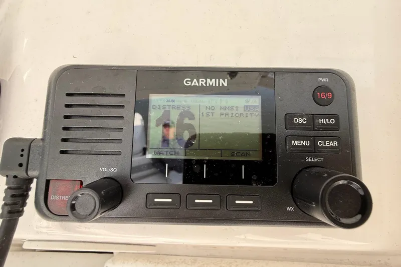 Slide: The Image of Garmin marine radio on 2025 Sea Fox 248 Commander boat dashboard. - 15