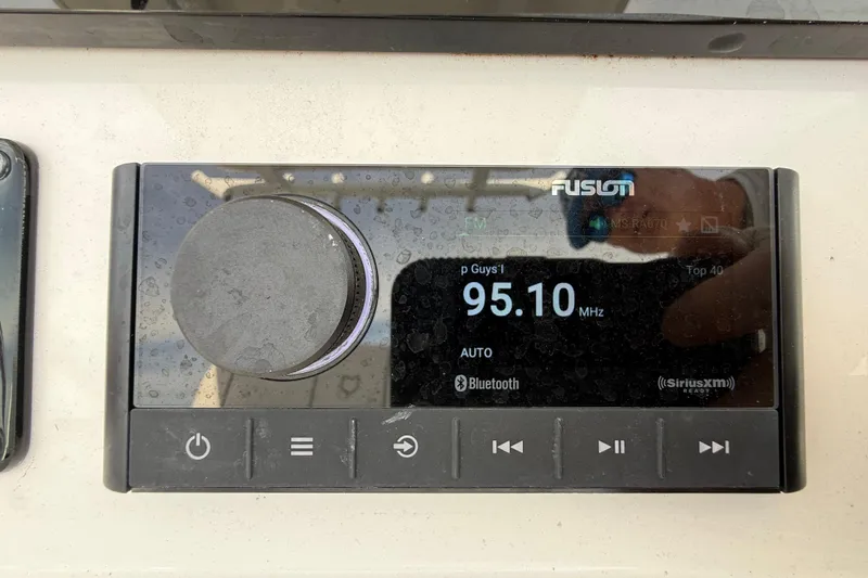 Slide: The Image of Fusion marine stereo system on a 2025 Sea Fox 248 Commander boat. - 16