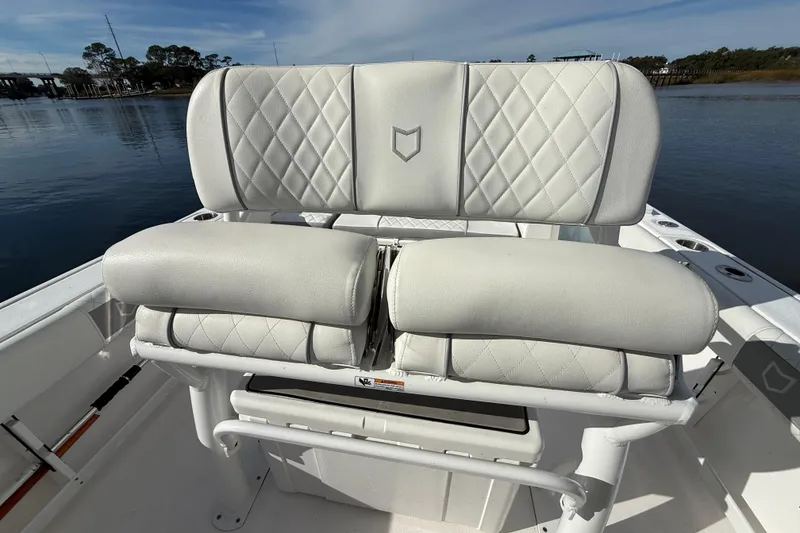 Slide: The Image of 2025 Sea Fox 248 Commander boat with luxurious white seating and diamond stitching. - 21