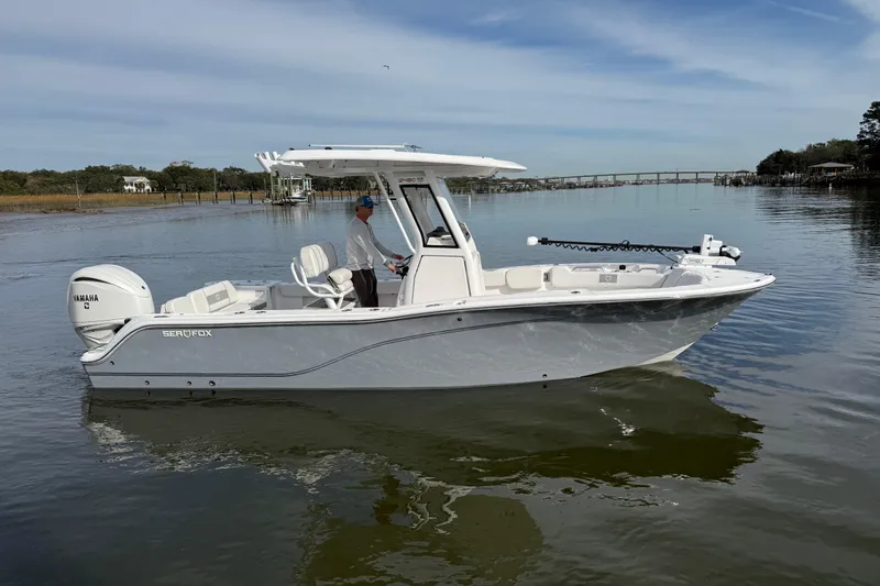 Slide: The Image of 2025 Sea Fox 248 Commander boat on calm water with Yamaha engine. - 3