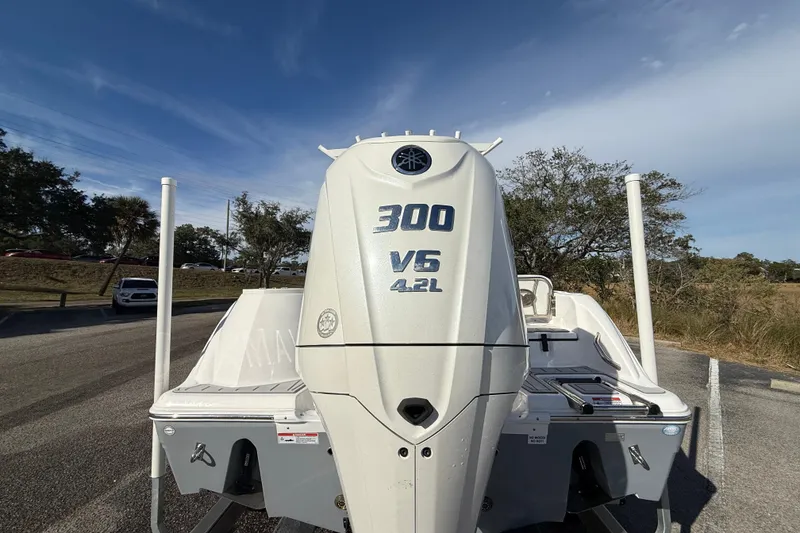 Slide: The Image of 2025 Sea Fox 248 Commander with 300 V6 4.2L engine, parked outdoors. - 8