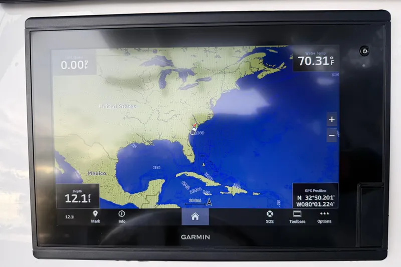 Slide: The Image of Garmin GPS display on 2021 Sea Fox 228 Commander, showing map and water temperature. - 14