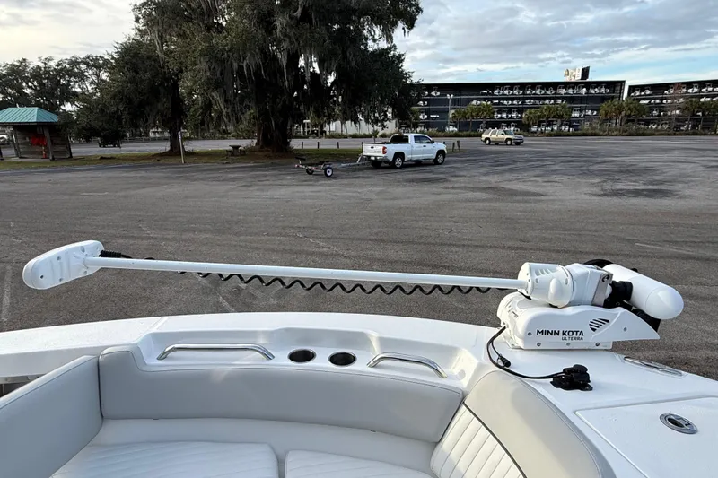 Slide: The Image of 2021 Sea Fox 228 Commander with Minn Kota Ulterra trolling motor in parking lot. - 27