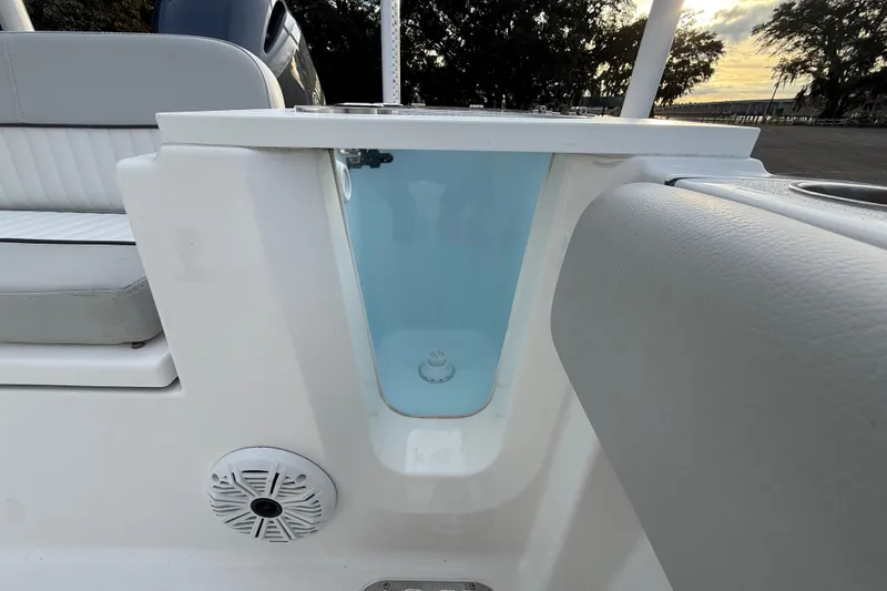 Slide: The Image of 2021 Sea Fox 228 Commander boat interior with seating and storage compartment. - 30