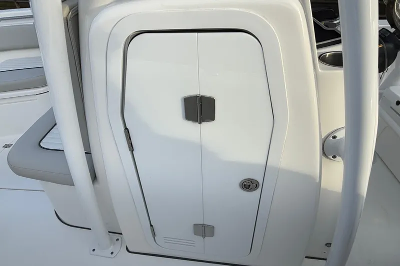 Slide: The Image of 2021 Sea Fox 228 Commander boat console with storage compartment and seating. - 34