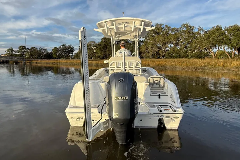 Slide: The Image of 2021 Sea Fox 228 Commander boat on calm water, rear view with Yamaha 200 engine. - 5