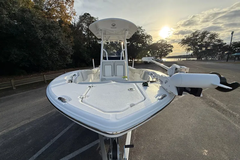 Slide: The Image of 2021 Sea Fox 228 Commander boat parked, showcasing sleek design and modern features. - 9